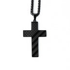 Black cross pendant necklace on a white background